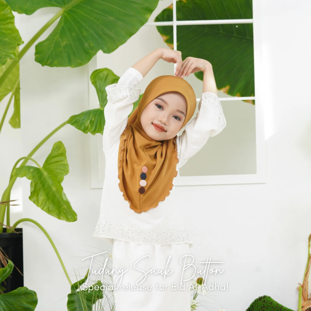 TUDUNG SAUK BUTTON